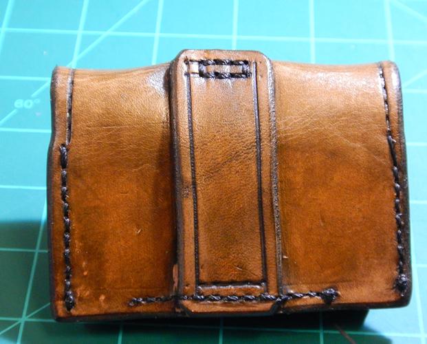 Name:  Leather Nagant Revolver Ammo Pouch (1).jpg
Views: 114
Size:  48.0 KB