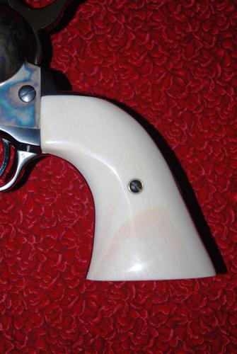 Name:  Colt SAA With Ivory (6).jpg
Views: 576
Size:  24.8 KB